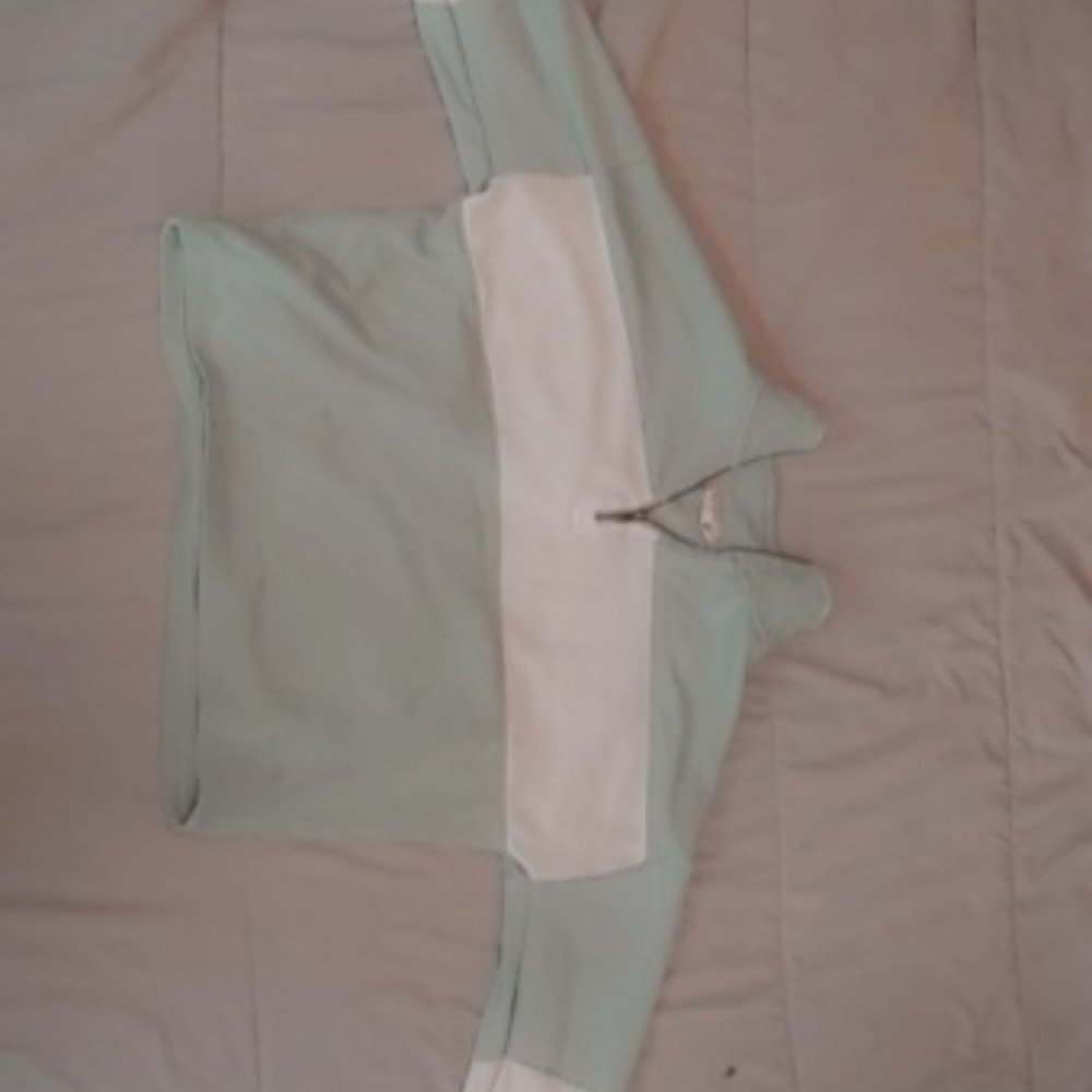 Teal and white pull over